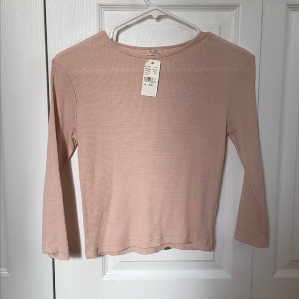 3/4 sleeve , slightly cropped